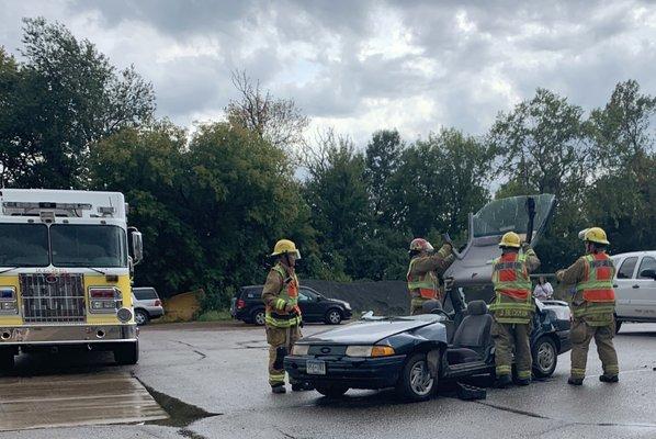 Rolling back the roof of a car in an extrication demonstration.