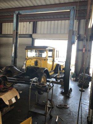 1942 taxi getting fixed at the shop