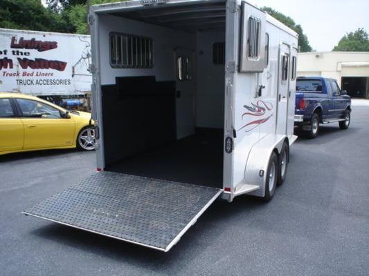 Horse trailer sprayed with Ultimate liner. Easy to clean messes, and saves the unit from rusting from the inside from Urine