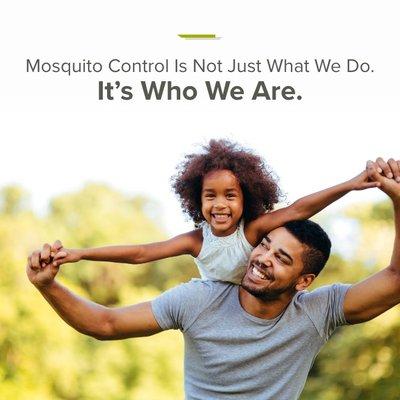 Father and Daughter enjoying yard after Mosquito Squad