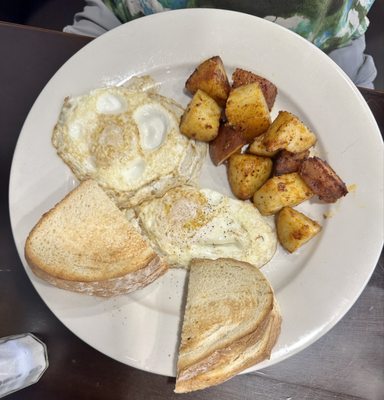 Fried Eggs, red potatoes and toast