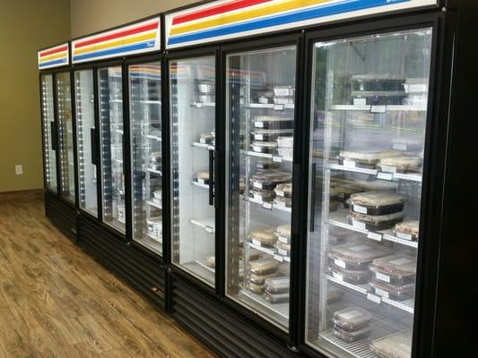 Eight freezers hold multiple sizes and types of dishes.   Not pictured,  a couple refrigerators.