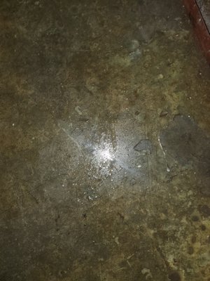 Water on the floor in the unit.