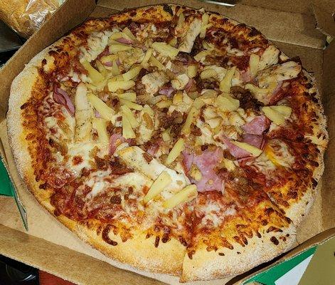 Hawaiian Chicken: ham, grilled chicken, bacon, pineapple, original sauce & signature 3 cheeses