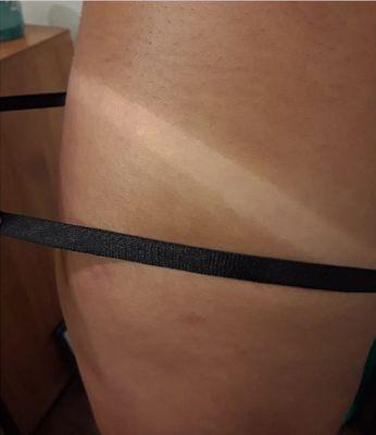 Custom Spray Tan using a medium/dark mix blend, perfect for our client's skin tone and preference.