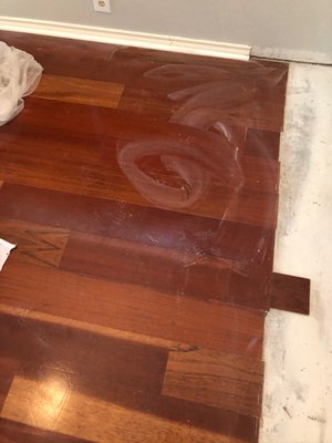 Left water and plaster on our HARDWOOD floors