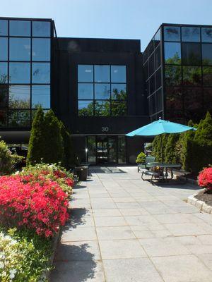 We are surrounded by lovely landscaping and a place for our clients and staff to take a break.