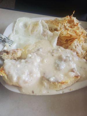 Eggs with hash browns and biscuit and gravy