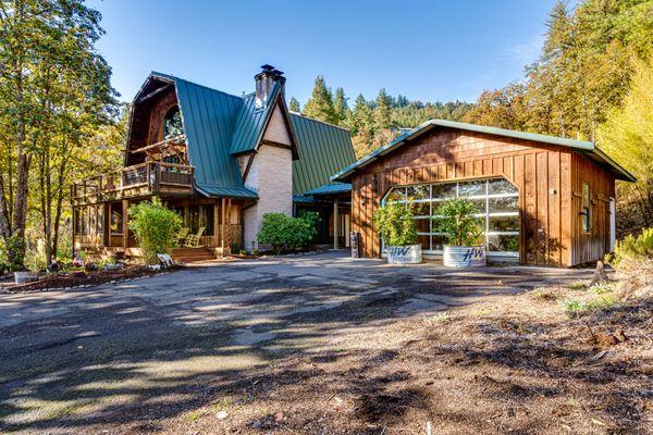 Unique home in every way! Over 5 acres directly across from the McKenzie River. Listed and sold by Tiffany Matthews.