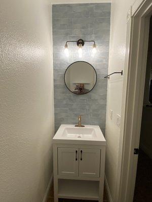 Half bath renovation. New vanity, tile, and fixtures I recently did.