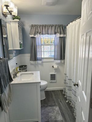 Newly remodeled bathroom by Dave Lane Home Improvements