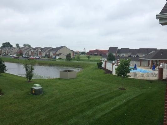 The lake and the clubhouse swimming pool which is the view from many apartments.