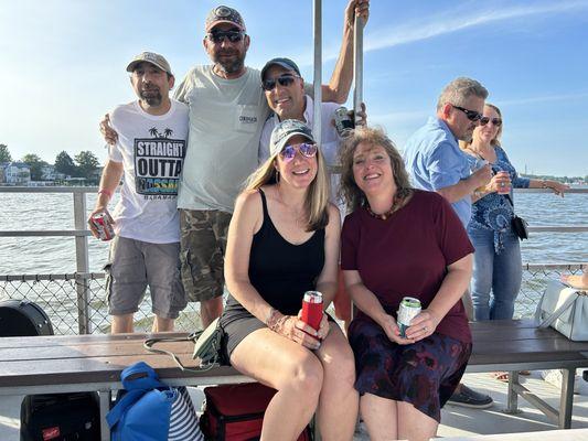 Friends and family enjoying the musics and boat ride