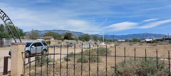 front view  thru the front Edith Blvd fence line looking Easterly