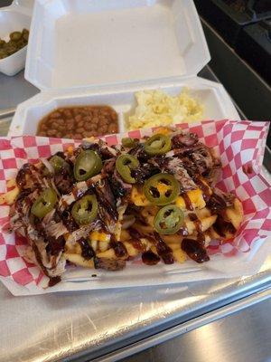 TK'S loaded bbq waffle fries!! Served with 2 homemade sides!!