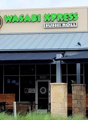 Wasabi Express is located in The Village of Allen nextdoor to Bliss Cupcake.