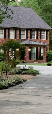 Residential with composition and metal roofs in Porter, Texas.