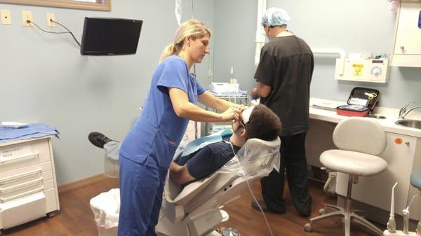 Dental hygienist at work