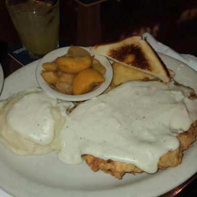 Chicken fried steak, mashed potatoes, cinnamon apples, toast.