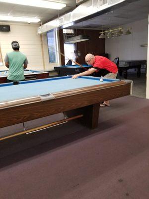 Sid, Victor and Nate shooting Pool at Velvets.