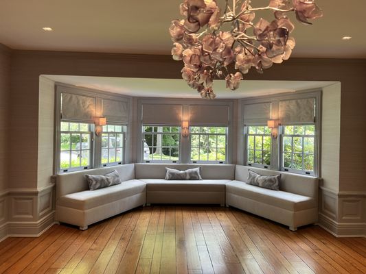 Custom bench & roman shades.