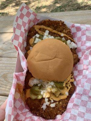 Huge pork tenderloin sandwich with jalapeños, onions and their special sauce!