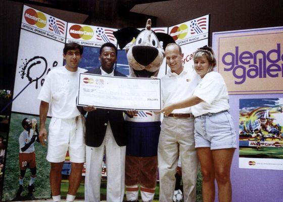 Flashback to WorldCup '94 - on stage with soccer legend Pelé to help present scholarship grants from Mastercard to local soccer programs.