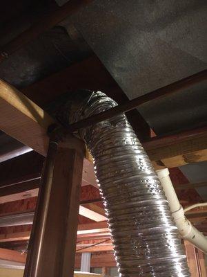 Photos taken as installers are leaving the job. Damaged the new ventilation hose.