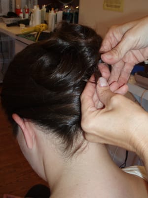 finishing a bridal up-do