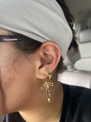 Snake bit conch piercing. I thought I was going to get a daith, but did not have the anatomy for it, and Lola helped me get to THIS :))