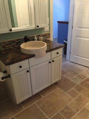 Vanity w/ Rain Forest marble, travertine basin