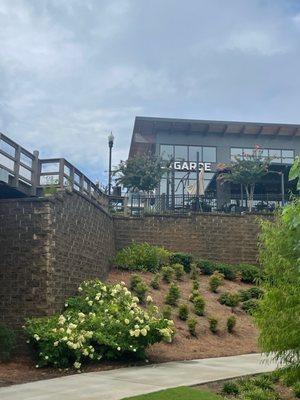 Path with restaurants above it