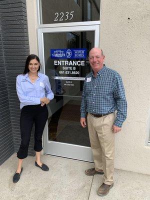 Mike Soper (owner) and Alli Cauzza (design & sales) outside the showroom.