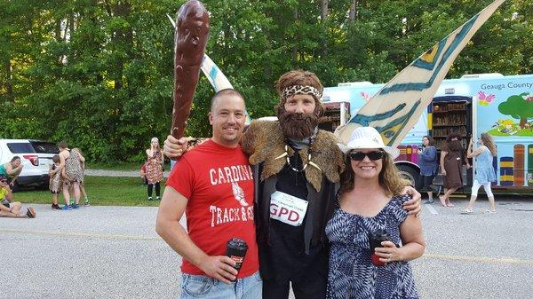 2017 Caveman crawl at West Woods. Perfect Occasion Costumes and Magic judging the costume contest