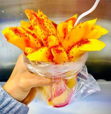 fresh mango with chamoy and tajin