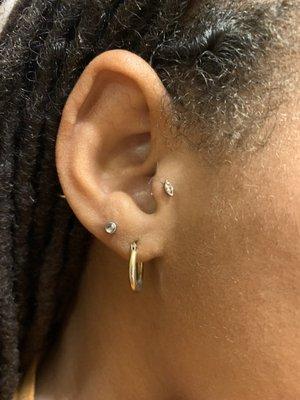 Nia pierced my tragus and second lobe!