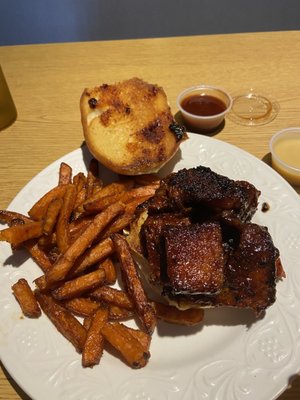 Burnt ends sandwich and sweet potato fries