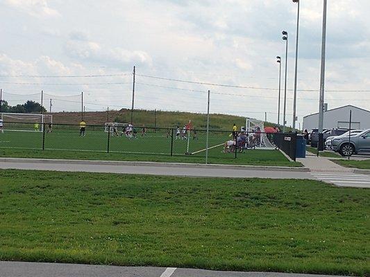 Soccer game in progress. There are several soccer fields at the complex.