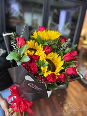 Bouquet: A dozen roses, three sunflowers & spray roses!