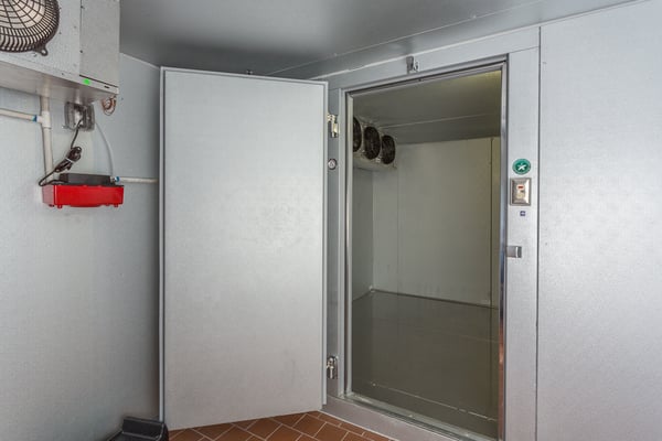 Large walk-in cooler/freezer available.