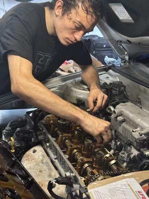 Cleaning up inside the head before new valve cover goes on.