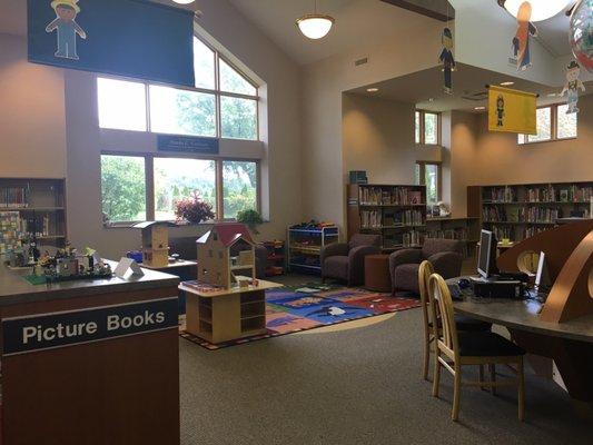 Kids section with play area and short tables