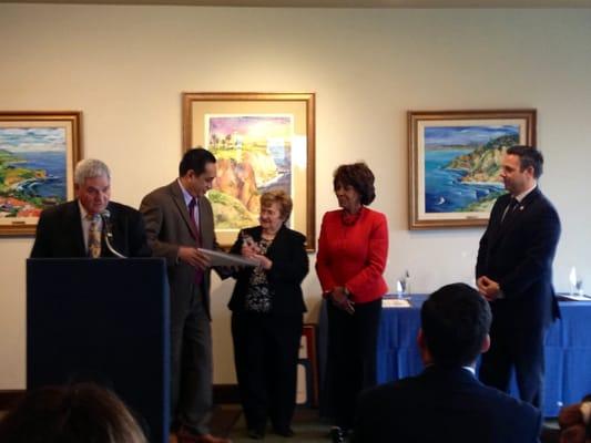 Receiving Volunteer of the year Award from Congresswoman Maxine Waters and Joe Buscaino