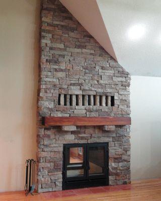 Custom -made stone fireplace