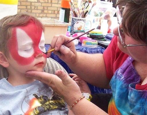 Spiderman face painting by Nancy Kartoon