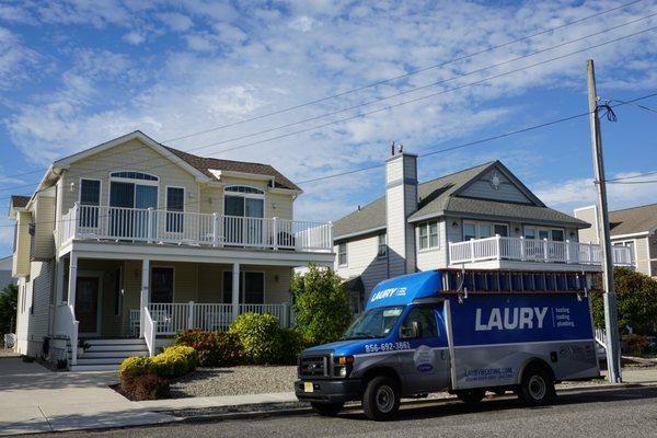 Laury Heating Cooling & Plumbing truck at the Jersey Shore for a heating and air conditioning installation.