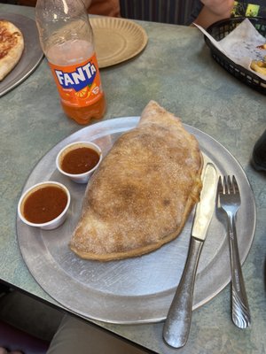 Ricotta, mozzarella and sausage Calzone