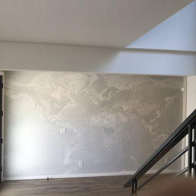 A full wall mural map installed in a home