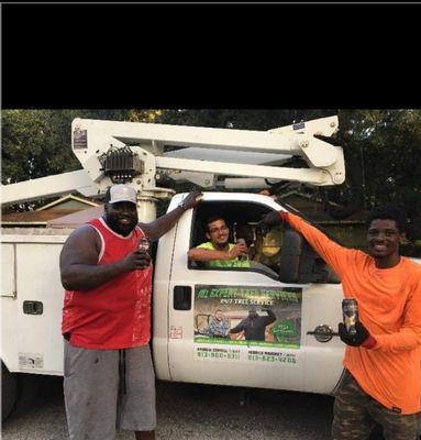 The crew after a long day we have 3 bucket Truck available