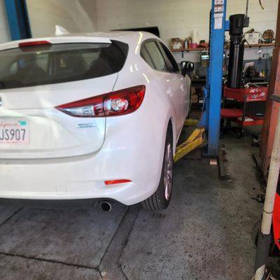 This mazda came in for a full service spark plugs, air filter, cabin filter, engine oil, tire rotation, ac service , and also front brakes